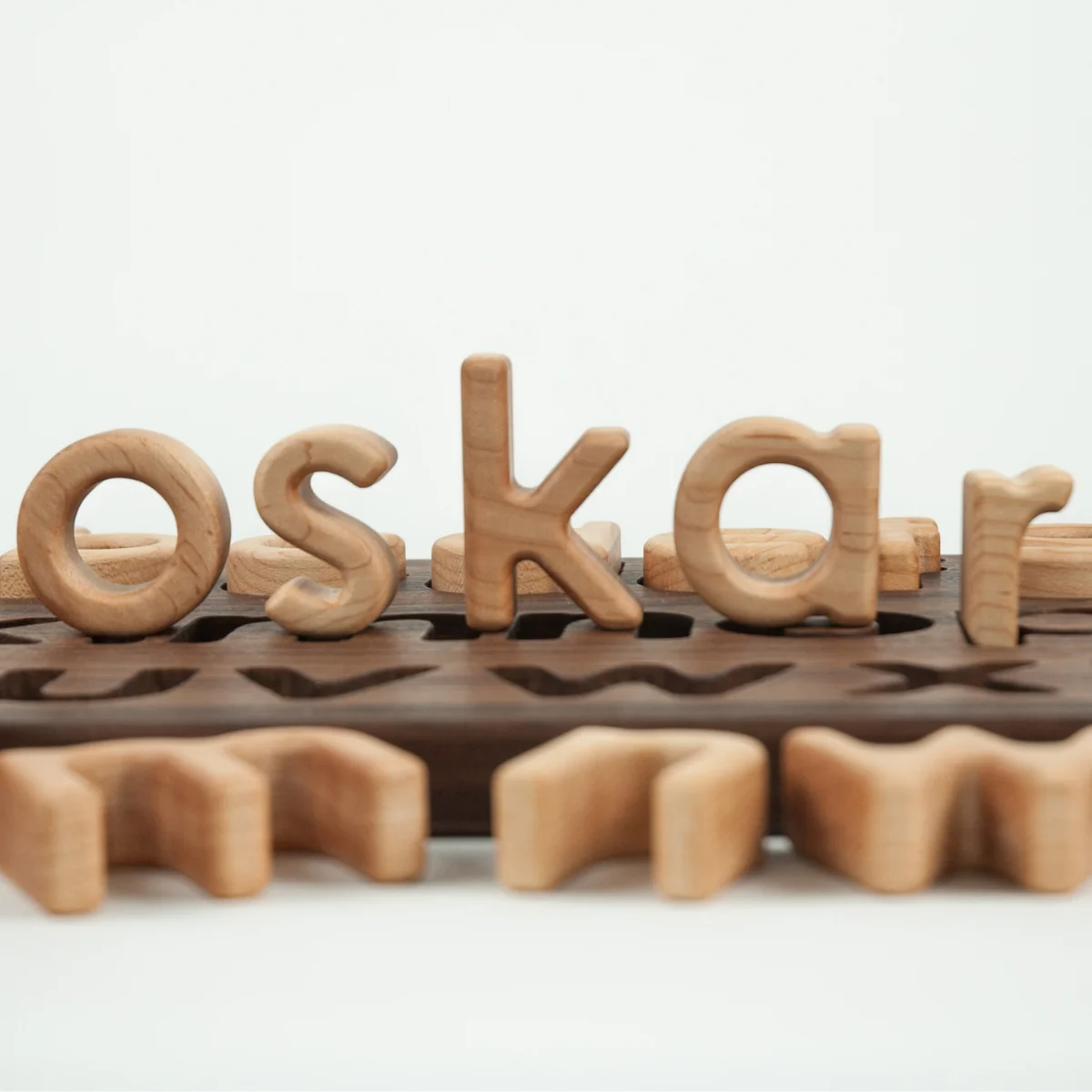 From Jennifer Lowercase Alphabet Letters Puzzle Walnut Board - Image 3